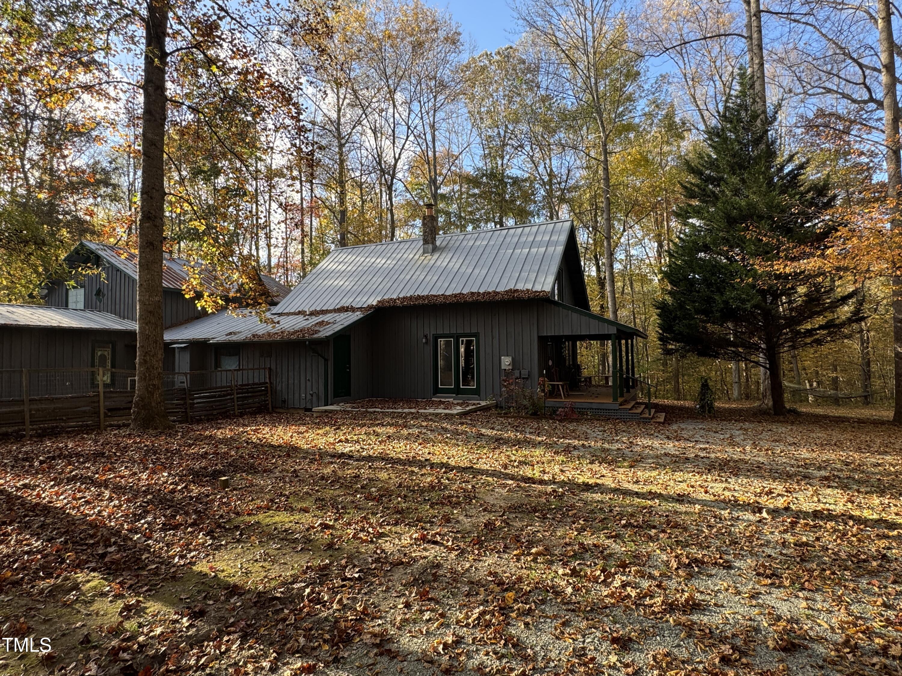 82 Woodspryte Hollow Road Timberlake, NC 27583 - Photo 12 of 29 a view of a house with a yard