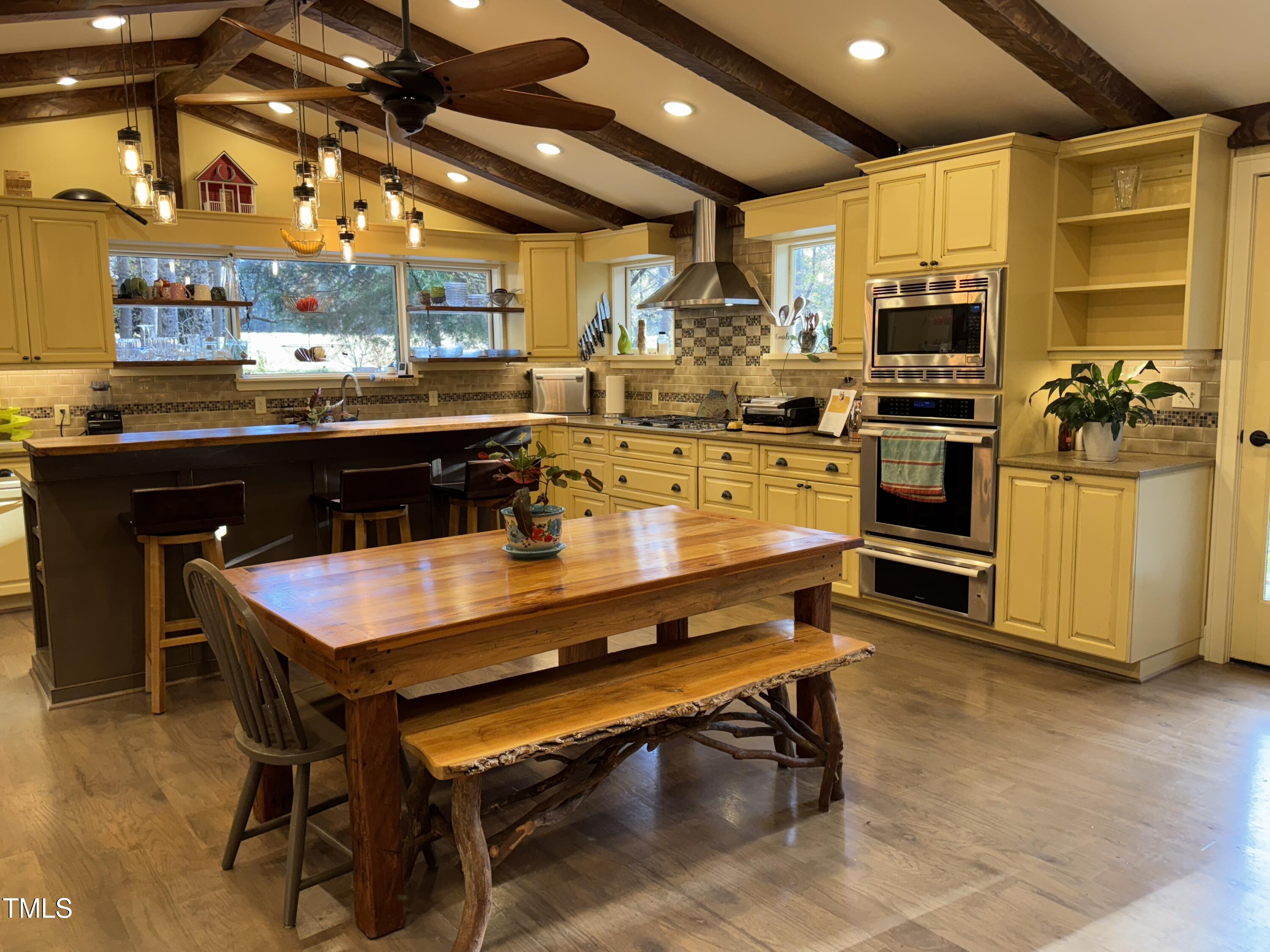 82 Woodspryte Hollow Road Timberlake, NC 27583 - Photo 2 of 29 a kitchen with a sink appliances and cabinets