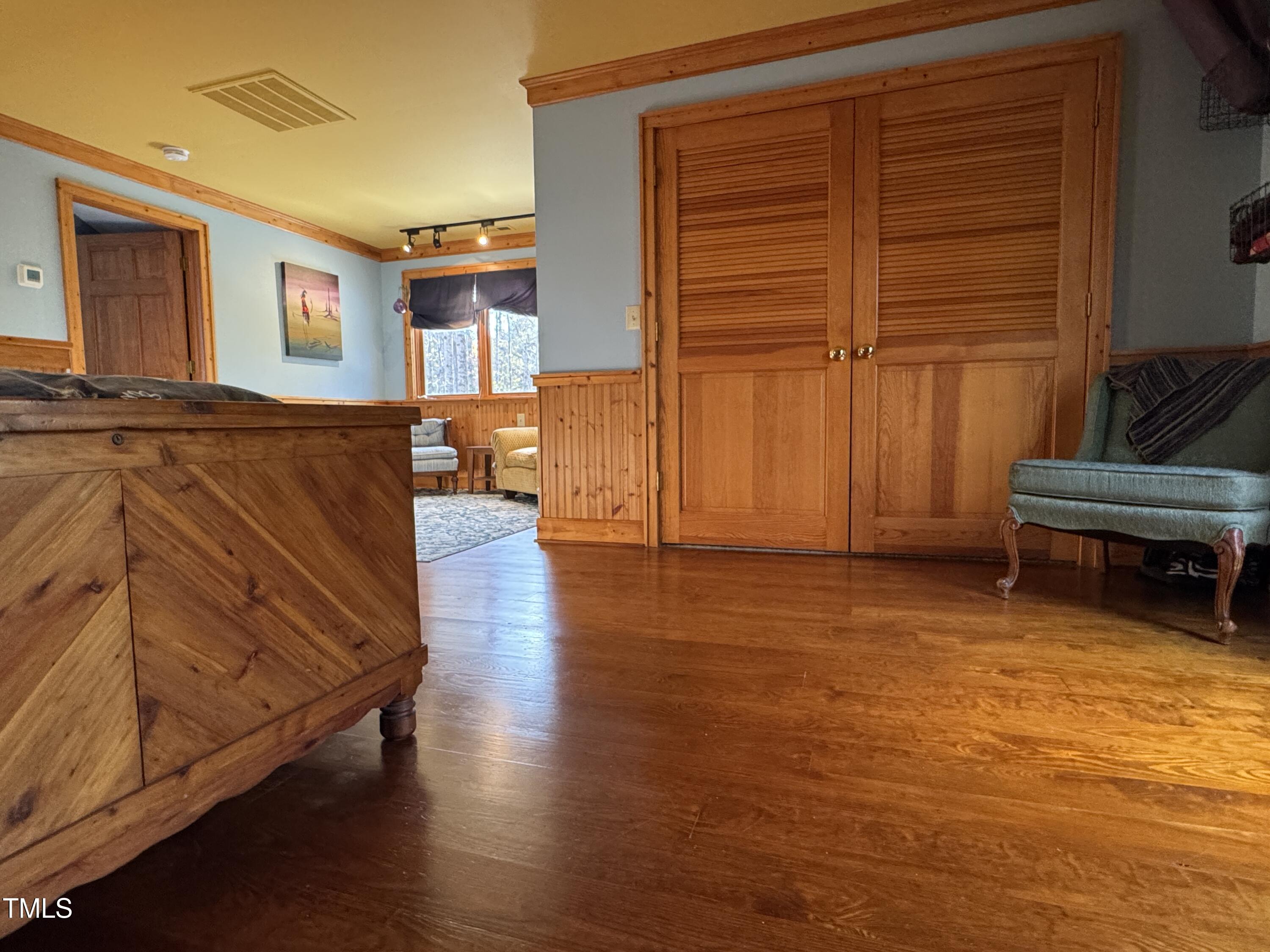 82 Woodspryte Hollow Road Timberlake, NC 27583 - Photo 21 of 29 a view of a living room with furniture and wooden floor