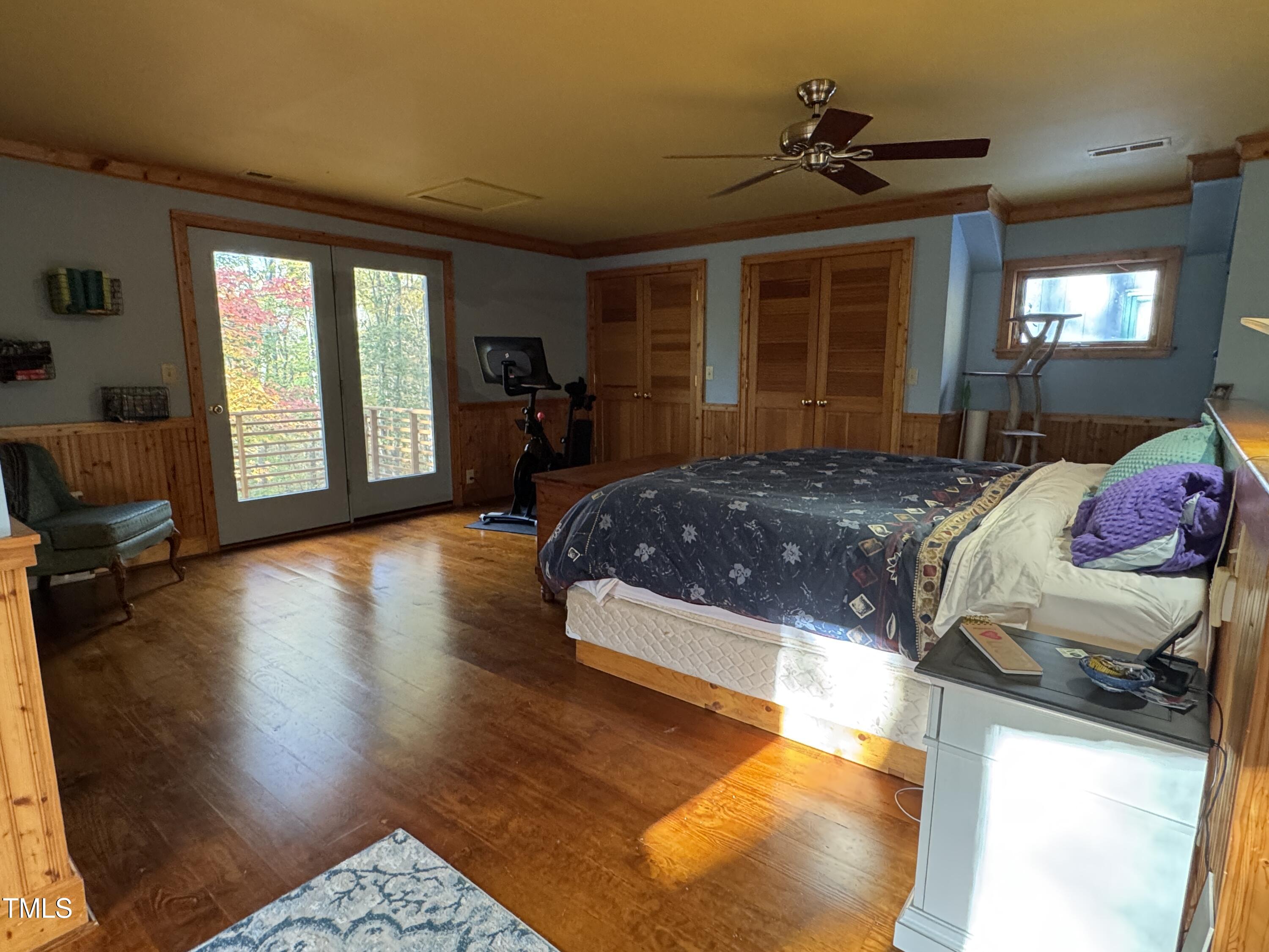 82 Woodspryte Hollow Road Timberlake, NC 27583 - Photo 8 of 29 a bedroom with a bed and wooden floor