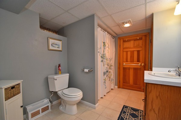 251 Beverly Road Worcester, MA 01605 - Photo 18 of 22 a bathroom with a toilet a sink and shower