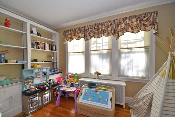 251 Beverly Road Worcester, MA 01605 - Photo 8 of 22 a room with furniture and a window