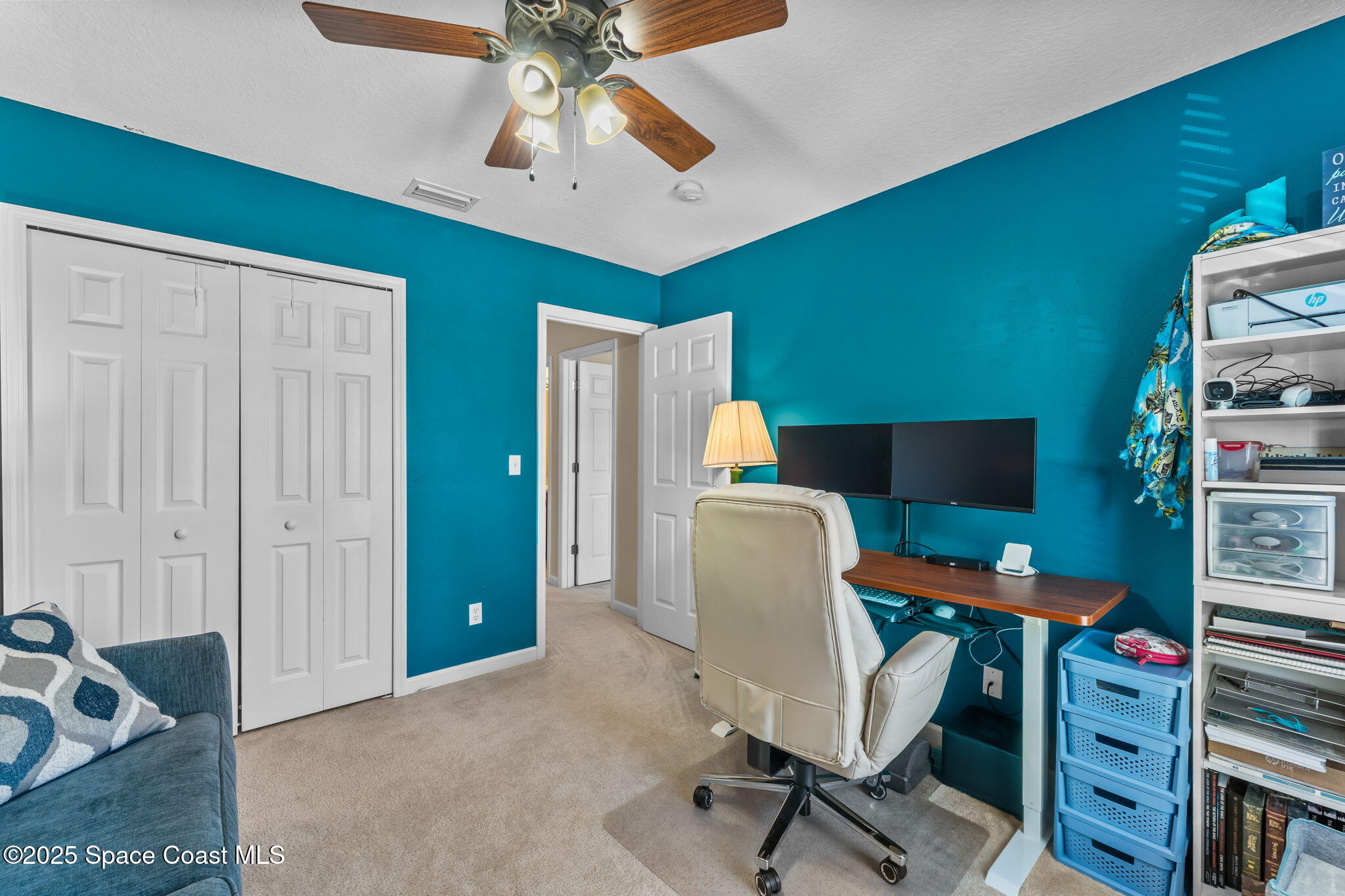2690 Revolution Street, Unit 104 Melbourne, FL 32935 - Photo 22 of 35 a view of a workspace with furniture and a window