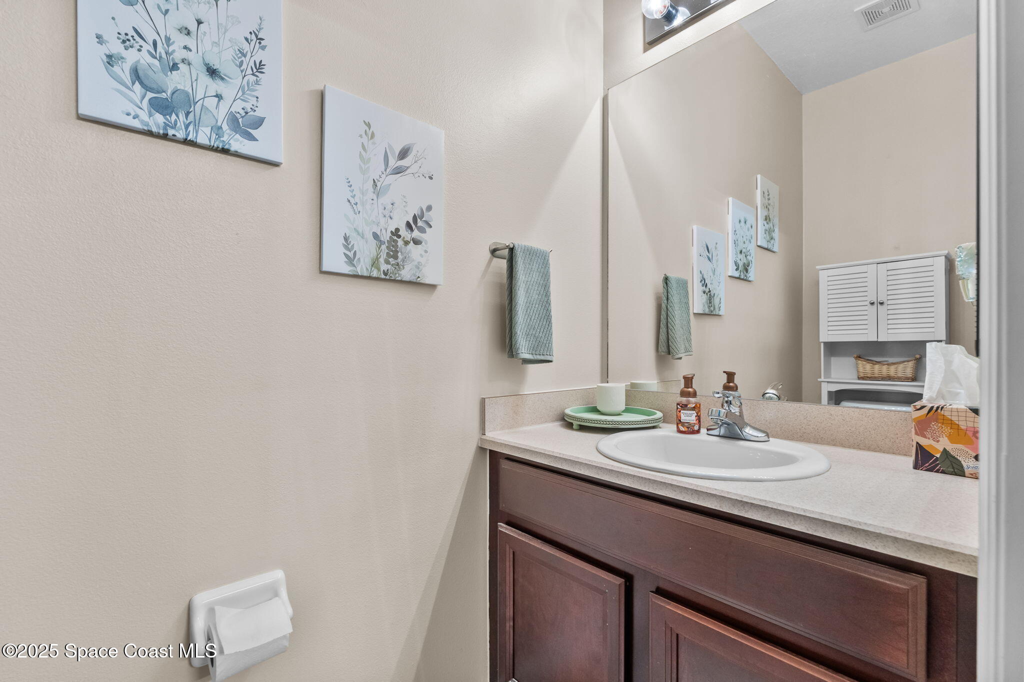 2690 Revolution Street, Unit 104 Melbourne, FL 32935 - Photo 6 of 35 Downstairs Half Bathroom