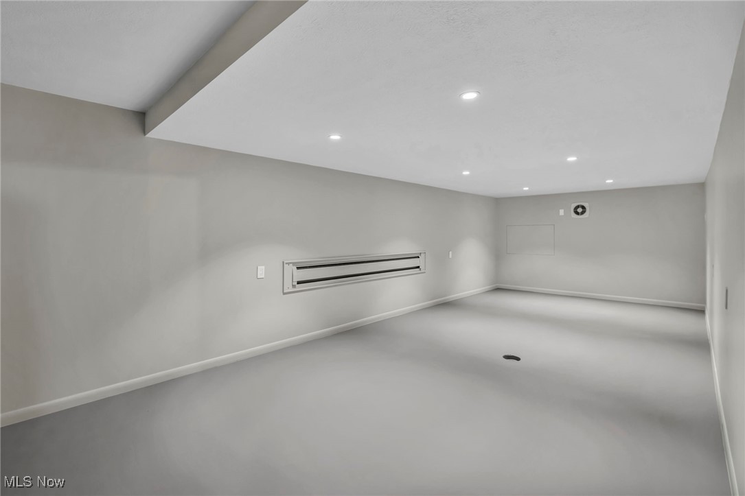 13962 Quarry Road Oberlin, OH 44074 - Photo 31 of 43 Finished basement with recessed lighting. also additional unfinsihed storage.