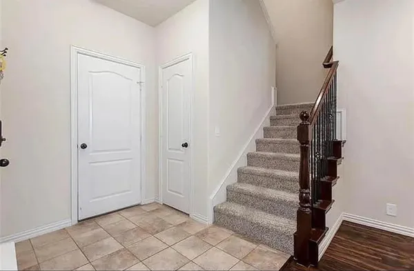 a view of entryway with stairs