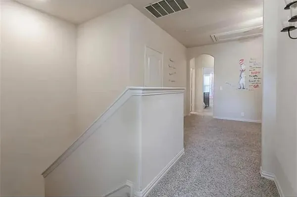a view of a livingroom with wooden floor