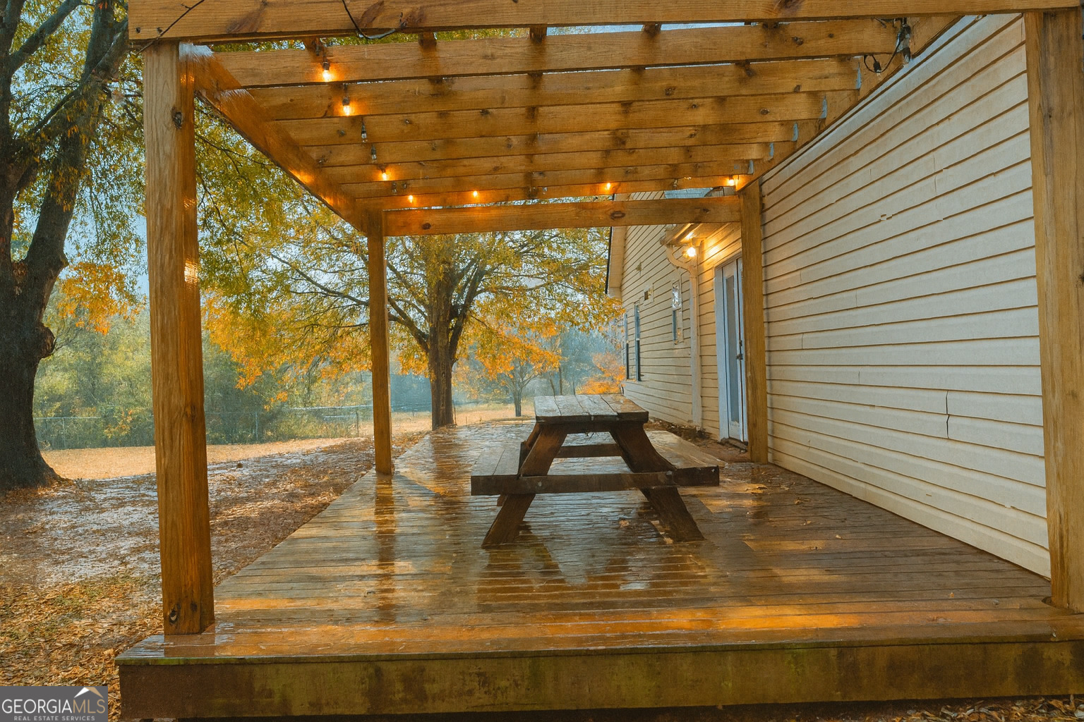 1145 Larkspur Drive Locust Grove, GA 30248 - Photo 12 of 15 a view of swimming pool with outdoor seating