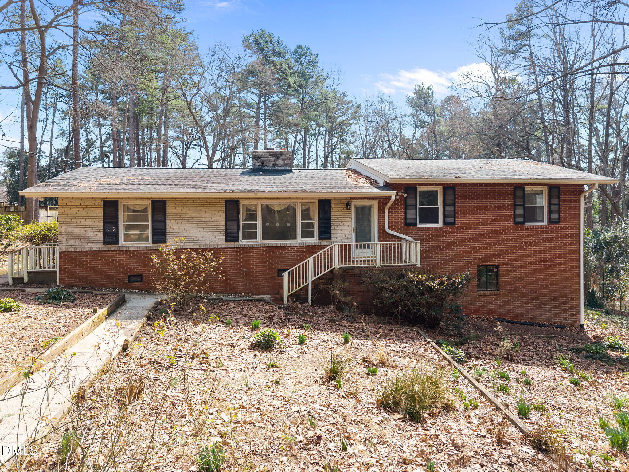 2009 Philcrest Road Raleigh, NC 27612 - Photo 1 of 29 a front view of a house with a yard