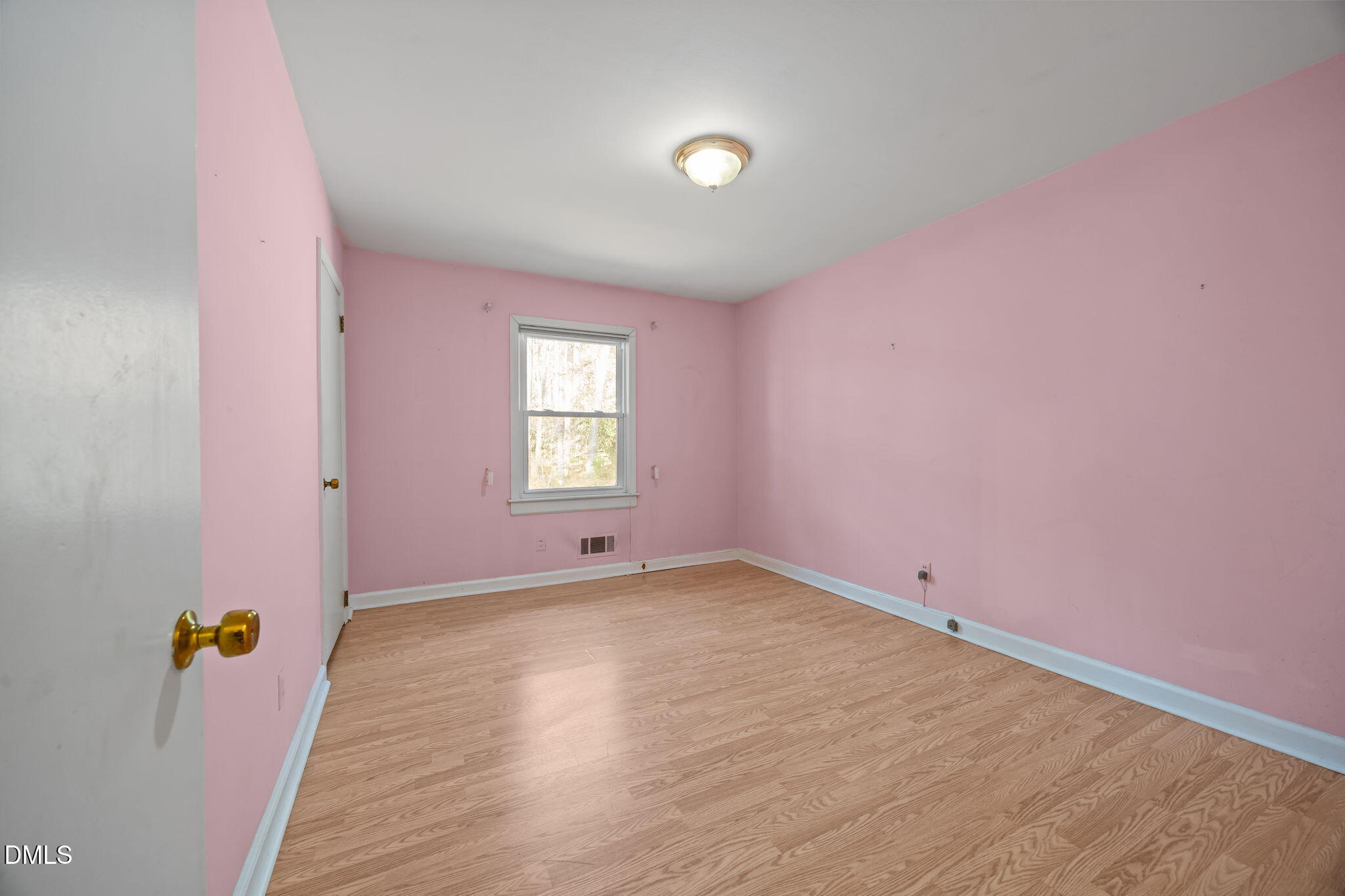 2009 Philcrest Road Raleigh, NC 27612 - Photo 13 of 29 an empty room with a window