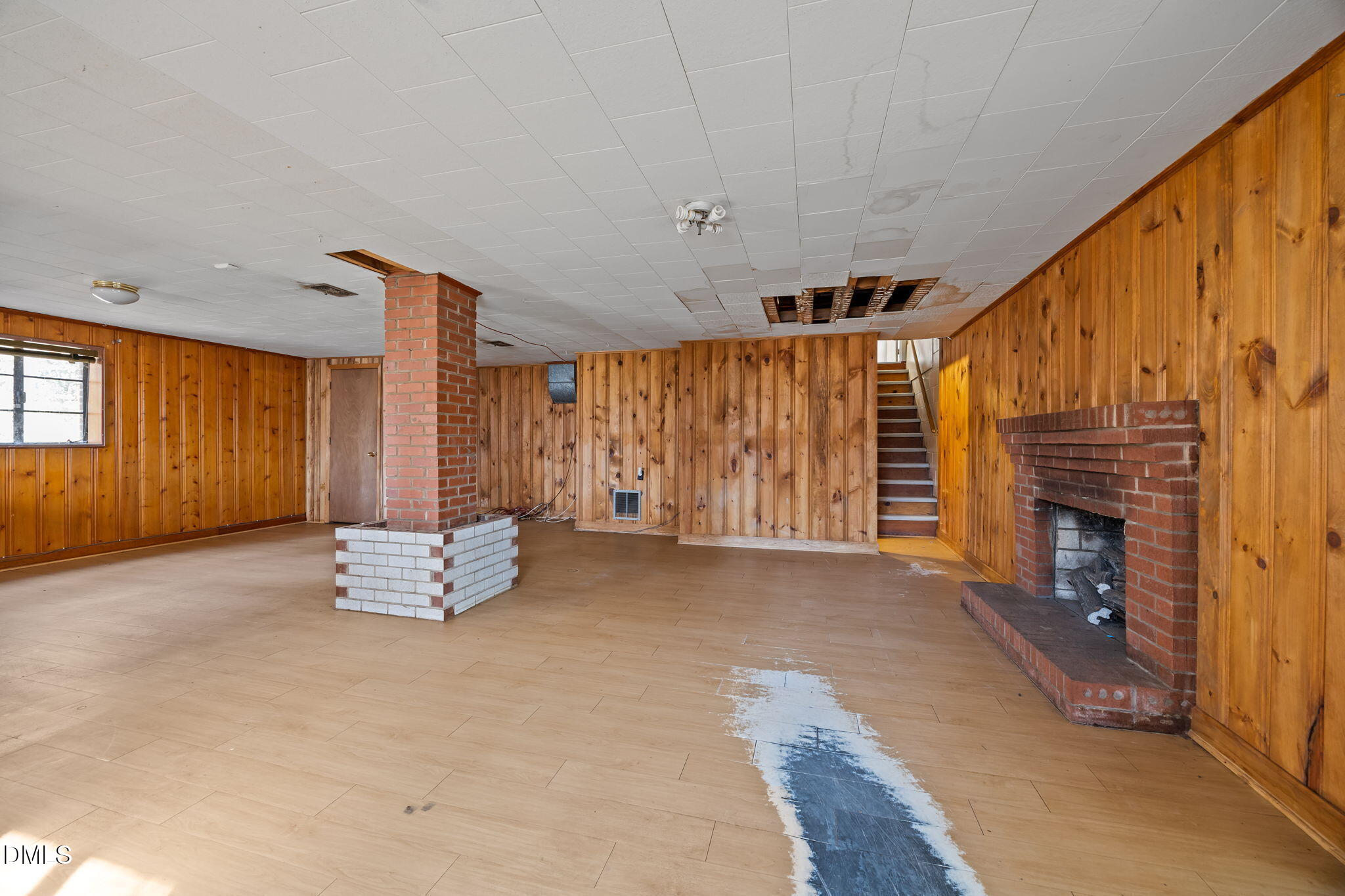 2009 Philcrest Road Raleigh, NC 27612 - Photo 21 of 29 a living room with furniture and a fireplace