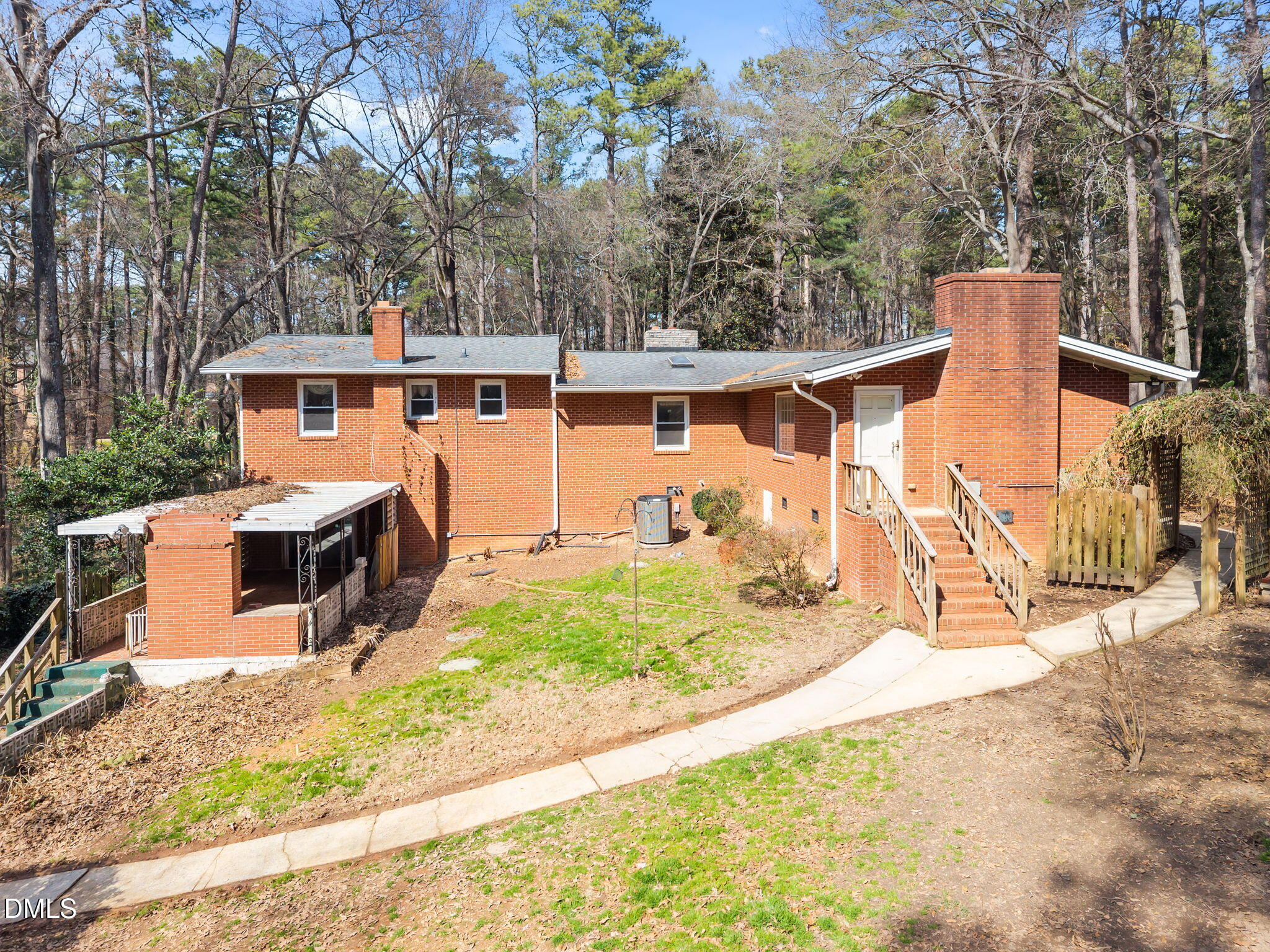 2009 Philcrest Road Raleigh, NC 27612 - Photo 25 of 29 a view of a backyard with a patio