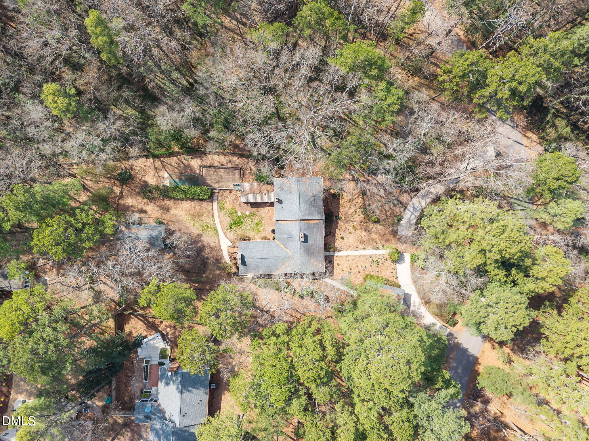 2009 Philcrest Road Raleigh, NC 27612 - Photo 28 of 29 a backyard of a building with large trees