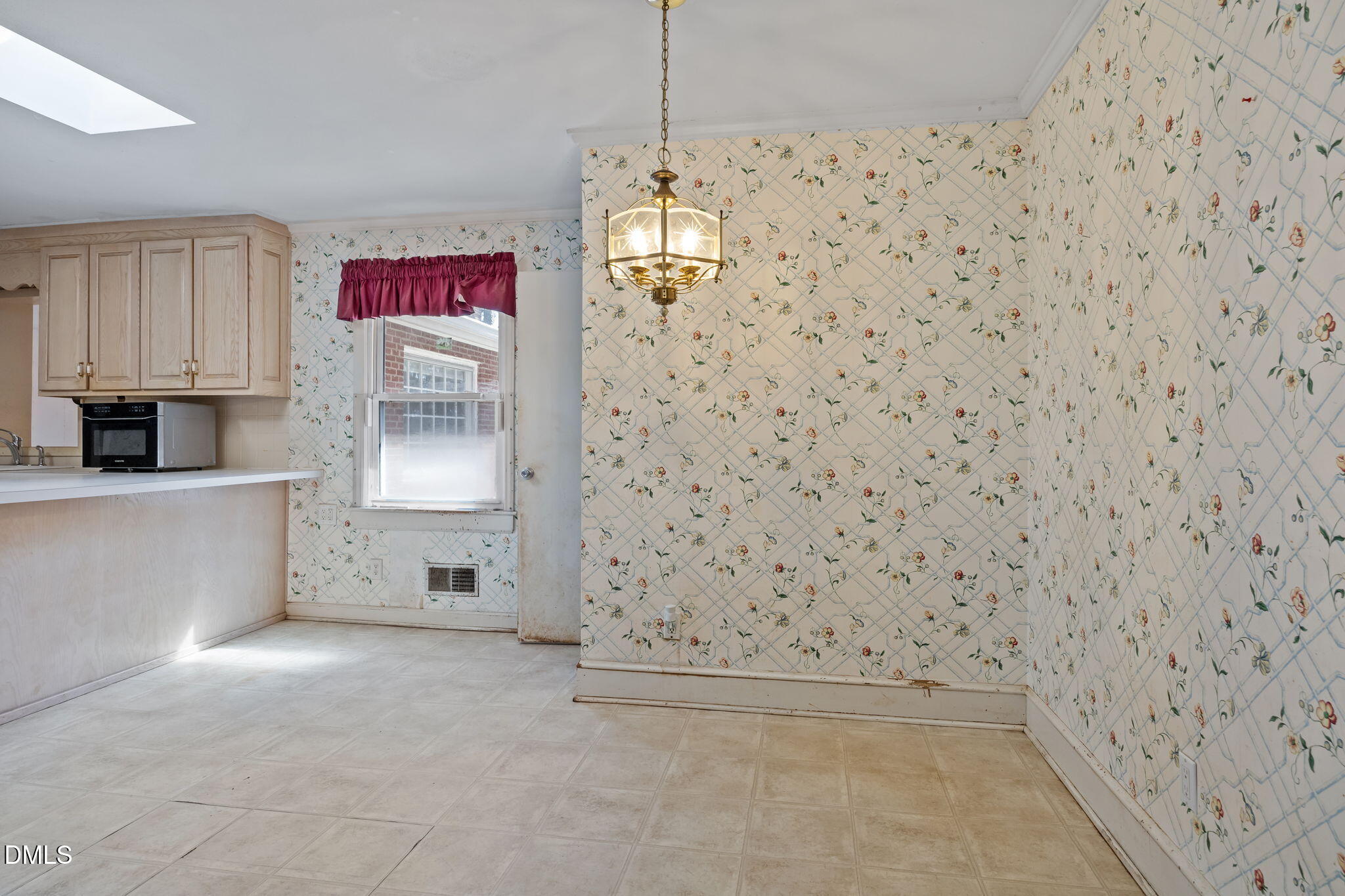 2009 Philcrest Road Raleigh, NC 27612 - Photo 6 of 29 a view of a hallway with closet
