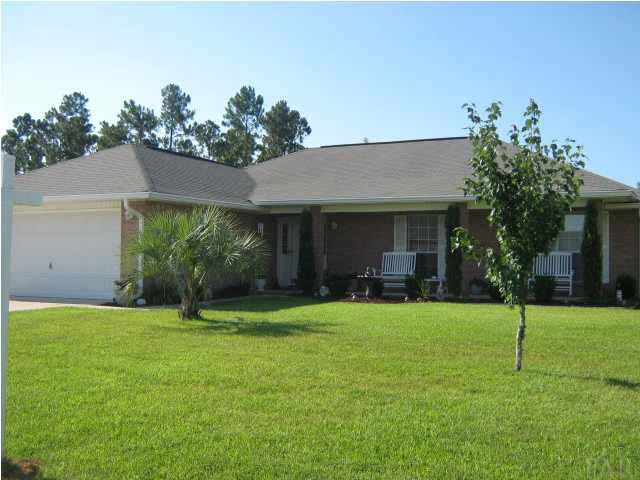 7165 Woodside Road Pensacola, FL 32526 - Photo 3 of 23 Great curb appeal, nice landscaping, and covered front porch.