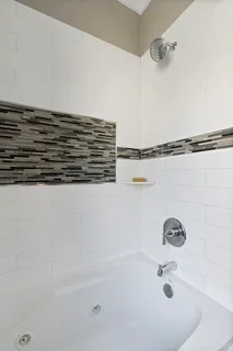 a bathroom with a bathtub
