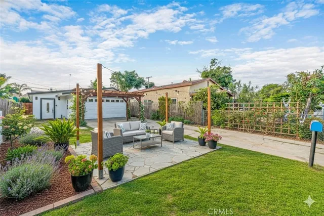 a view of a garden with patio