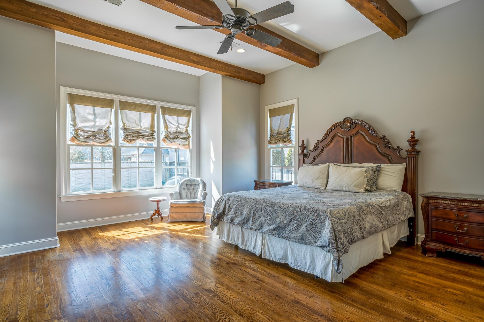 1247 Braywind Drive Collierville, TN 38017 - Photo 11 of 25 a bedroom with a bed and wooden floor