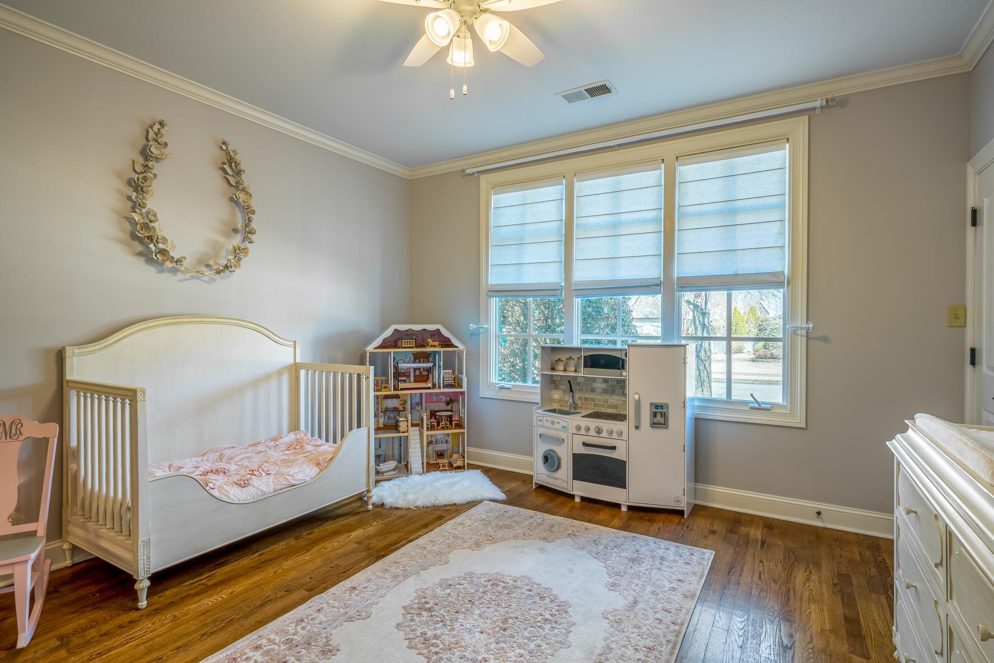 1247 Braywind Drive Collierville, TN 38017 - Photo 14 of 25 a bedroom with furniture and a window
