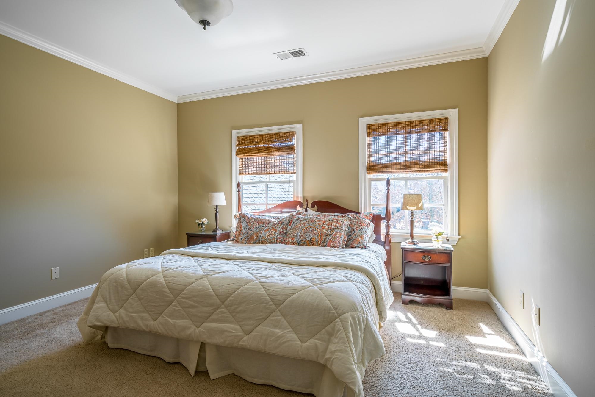 1247 Braywind Drive Collierville, TN 38017 - Photo 16 of 25 a bedroom with a bed and a window