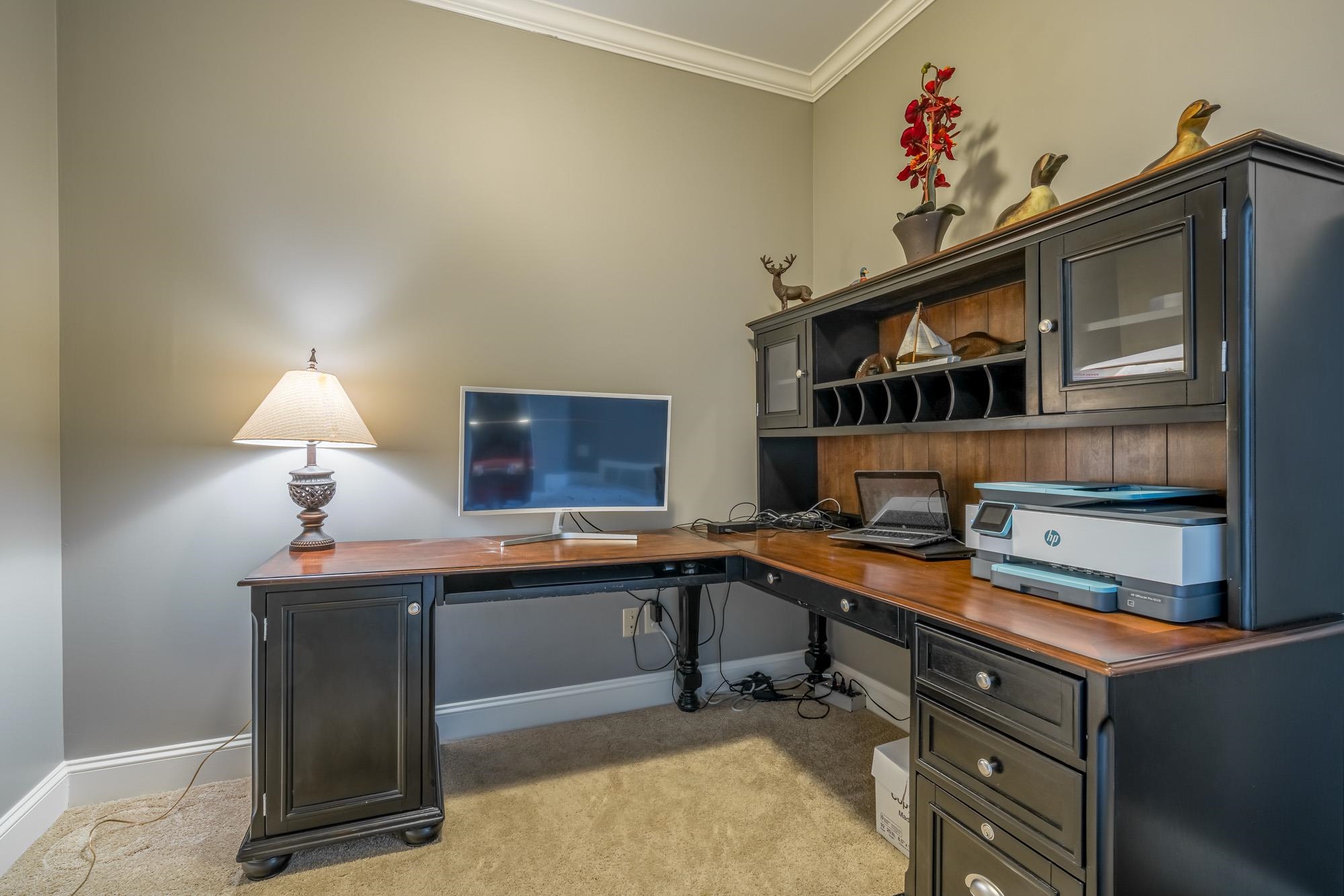 1247 Braywind Drive Collierville, TN 38017 - Photo 22 of 25 a room with a table chairs and a window