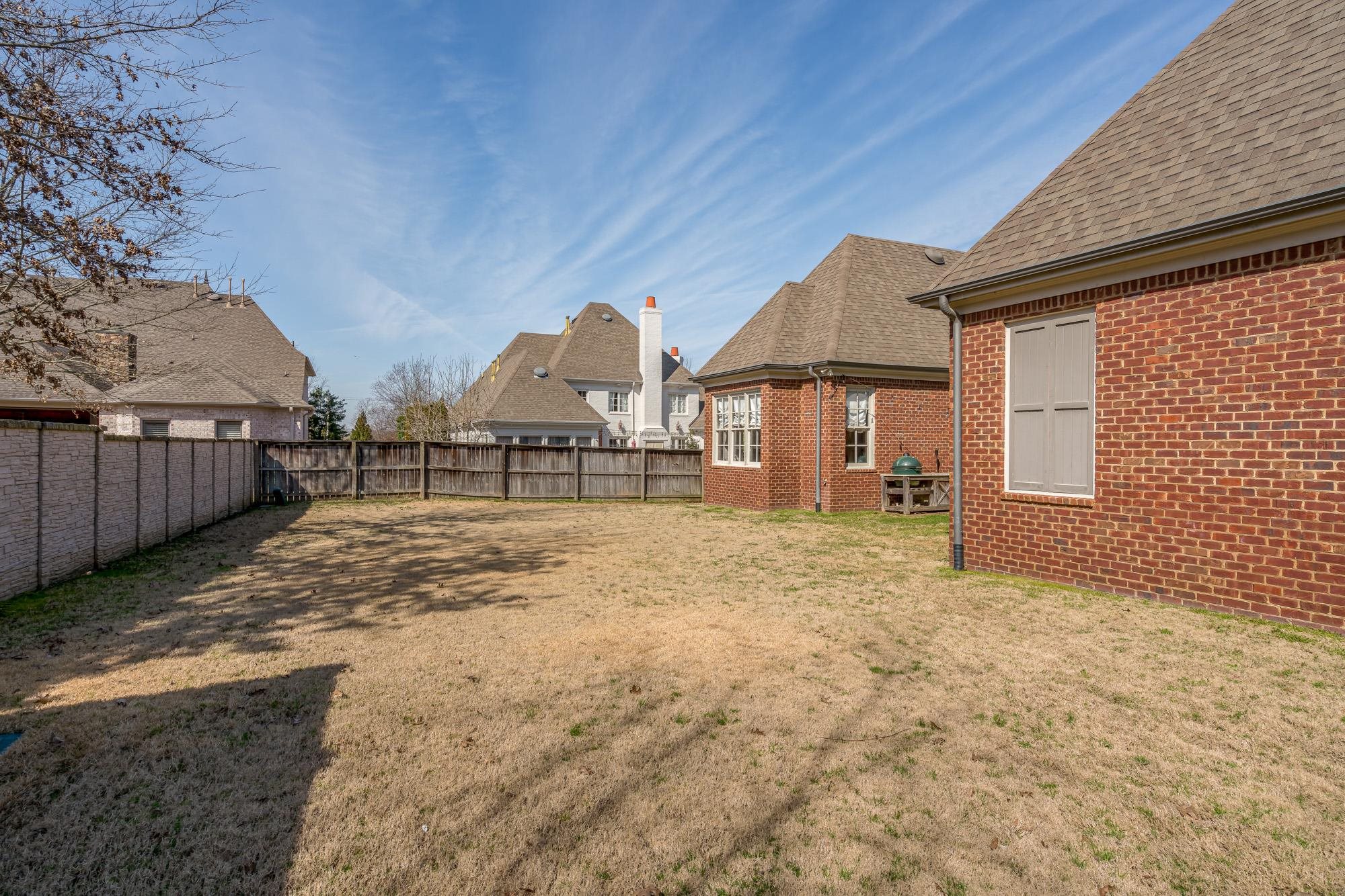 1247 Braywind Drive Collierville, TN 38017 - Photo 23 of 25 a view of a house with a yard