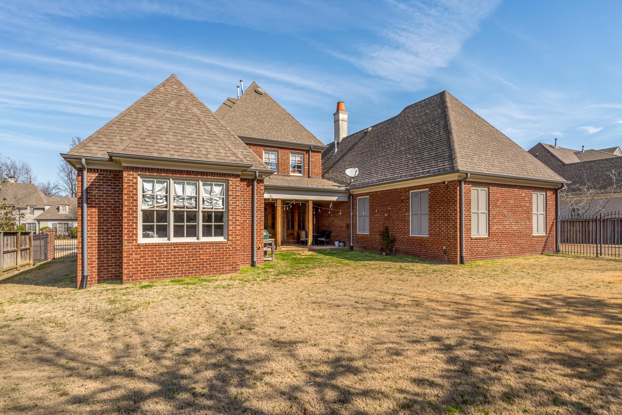 1247 Braywind Drive Collierville, TN 38017 - Photo 25 of 25 a house with yard in front of it