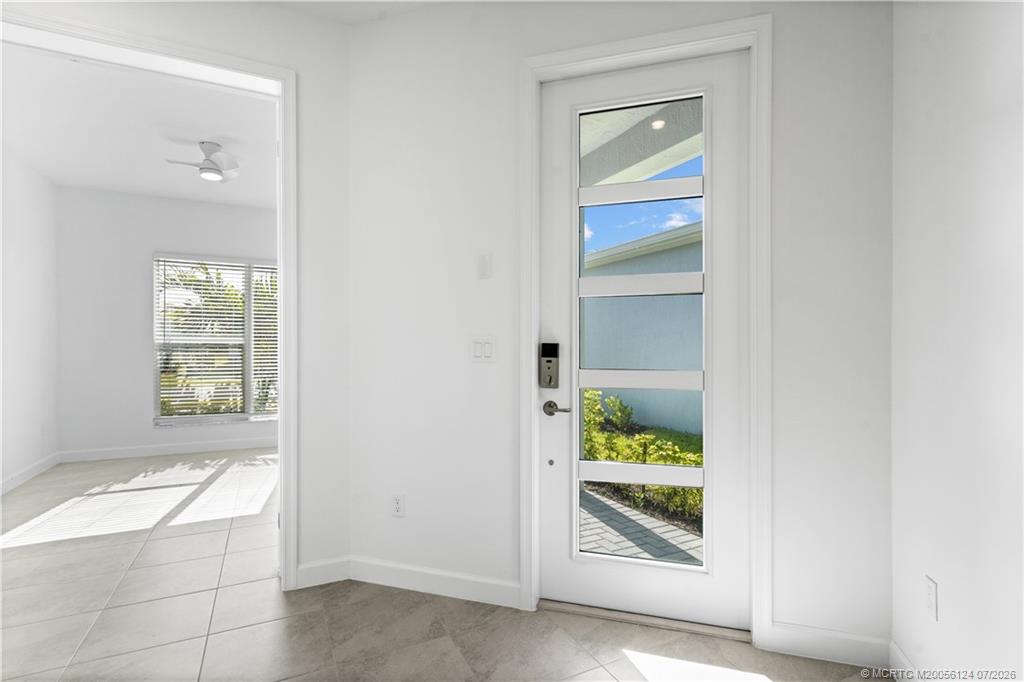 9731 Southwest Indra Way Port St. Lucie, FL 34987 - Photo 3 of 33 Entry and Flex Room