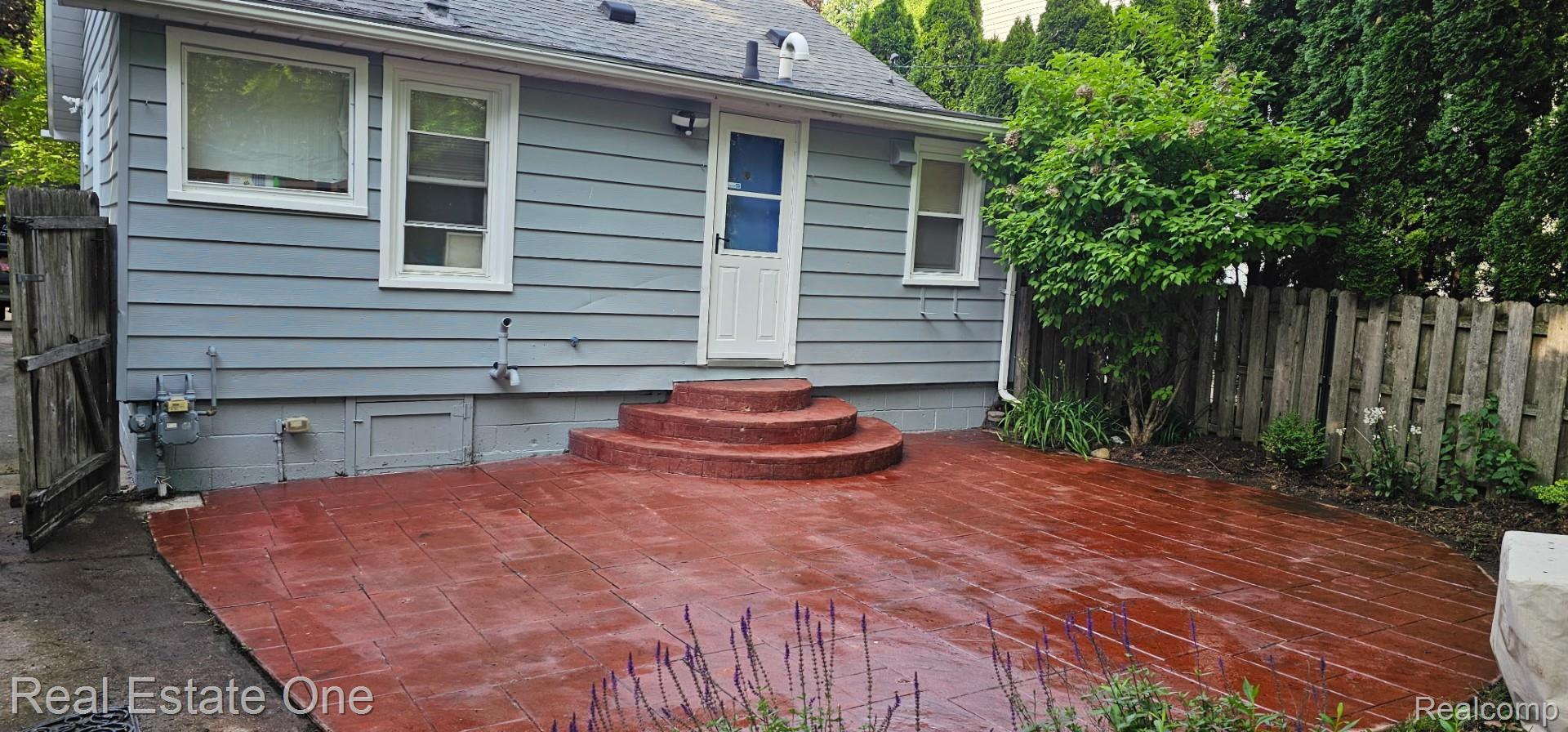 2073 Roslyn Road Grosse Pointe, MI 48236 - Photo 23 of 30 Lovely stamped concrete patio for B.B.Q.'s and summer entertaining.