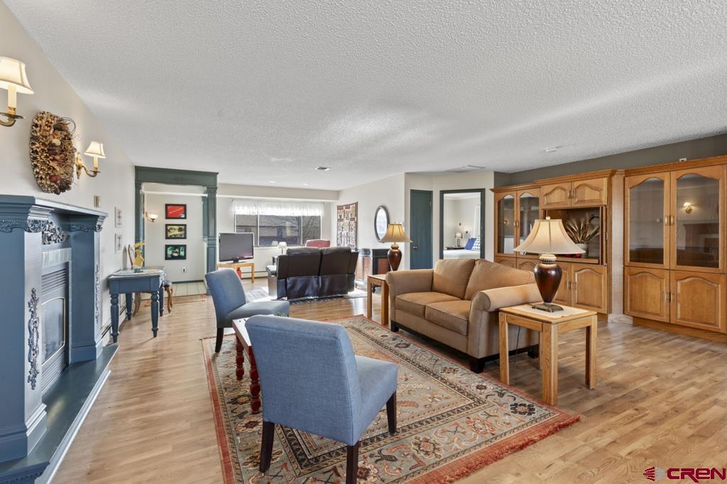 2135 Winston Way, Unit A Montrose, CO 81401 - Photo 21 of 27 a living room with furniture and a flat screen tv