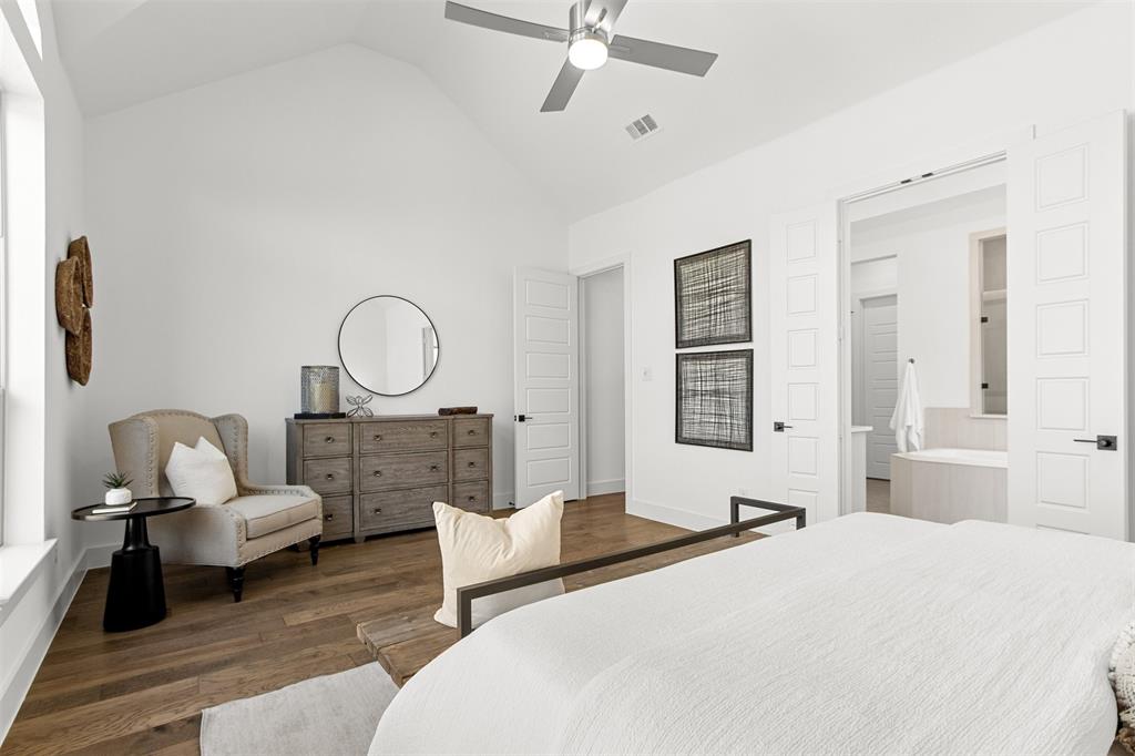 2808 Citation Road Celina, TX 75009 - Photo 16 of 40 a bedroom with bed and a large window