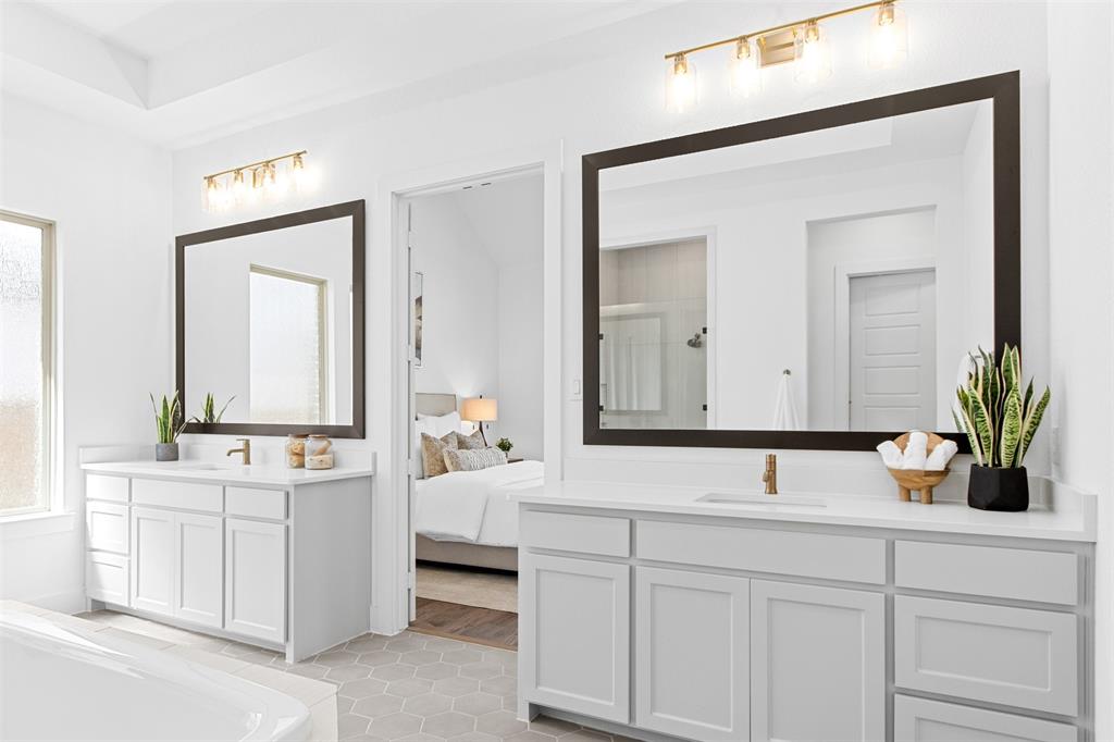 2808 Citation Road Celina, TX 75009 - Photo 18 of 40 a bathroom with a sink and a mirror