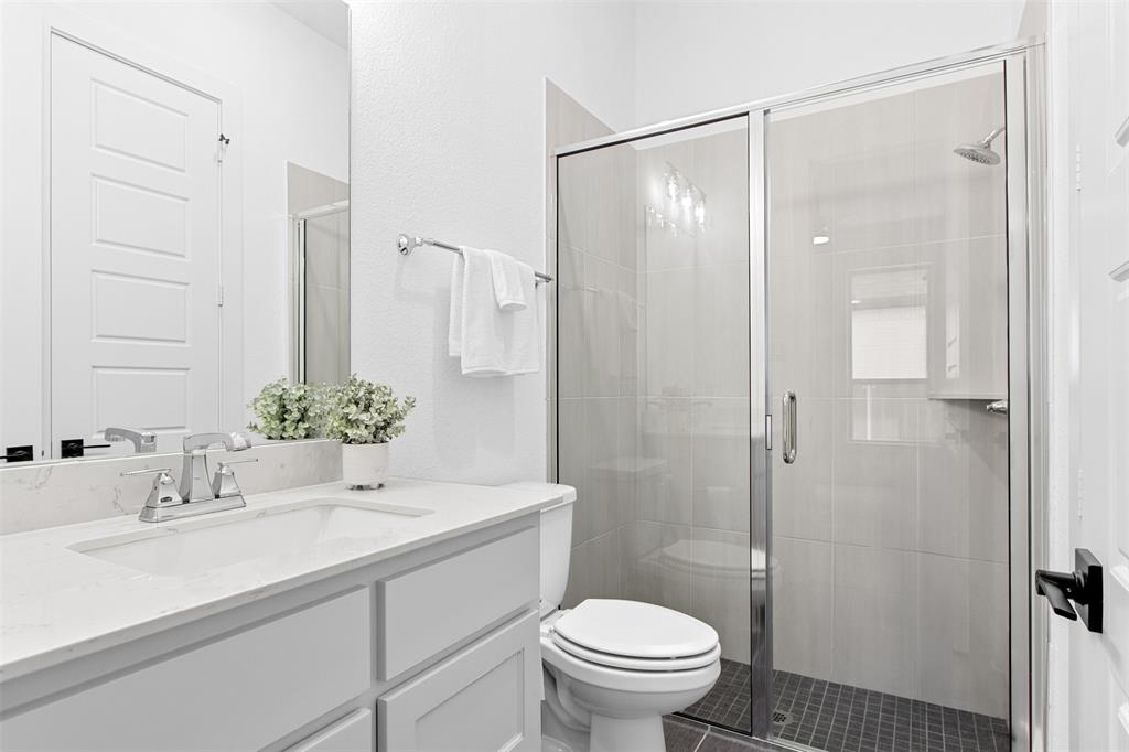 2808 Citation Road Celina, TX 75009 - Photo 28 of 40 a bathroom with a sink toilet and shower