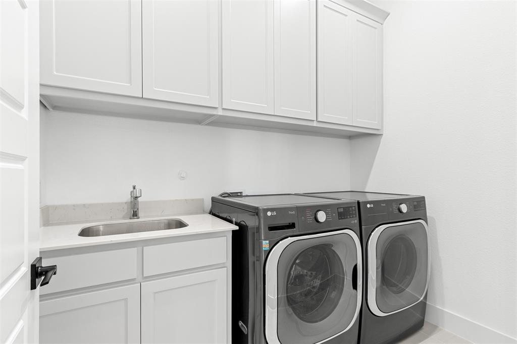2808 Citation Road Celina, TX 75009 - Photo 32 of 40 a utility room with dryer and washer