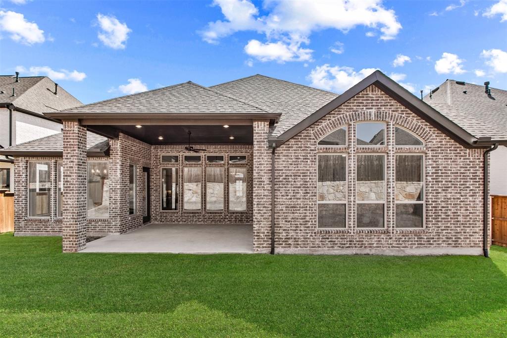 2808 Citation Road Celina, TX 75009 - Photo 33 of 40 a view of a house with a yard
