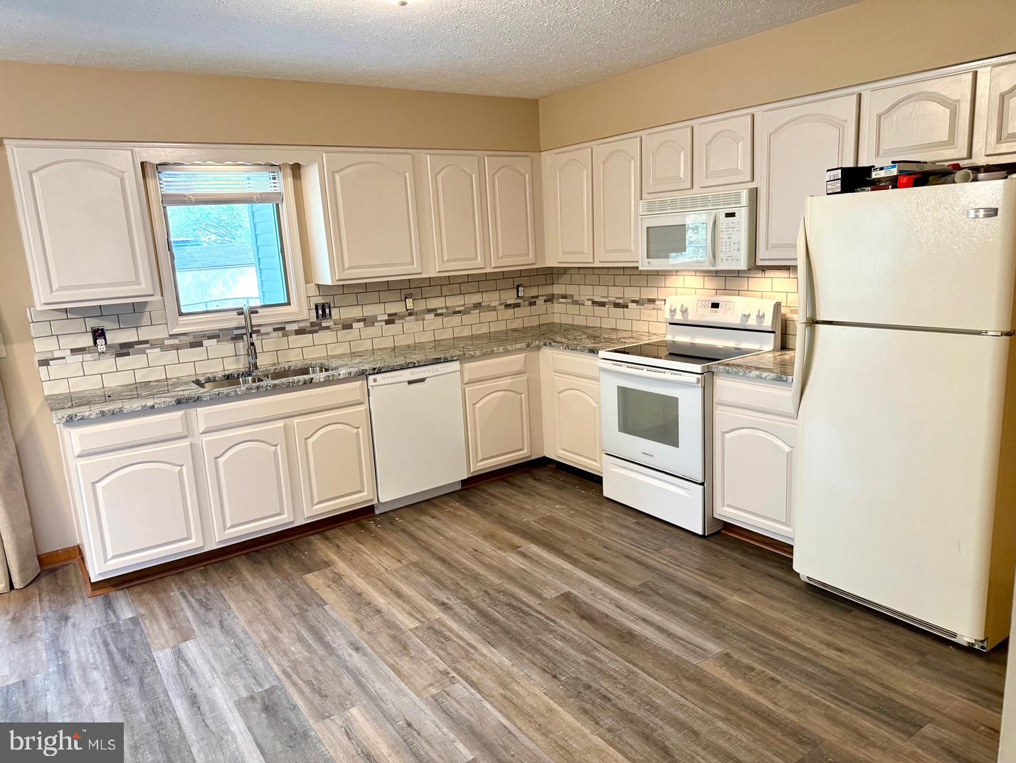 1121 Progress Road Chambersburg, PA 17201 - Photo 4 of 19 Bright and inviting kitchen space.