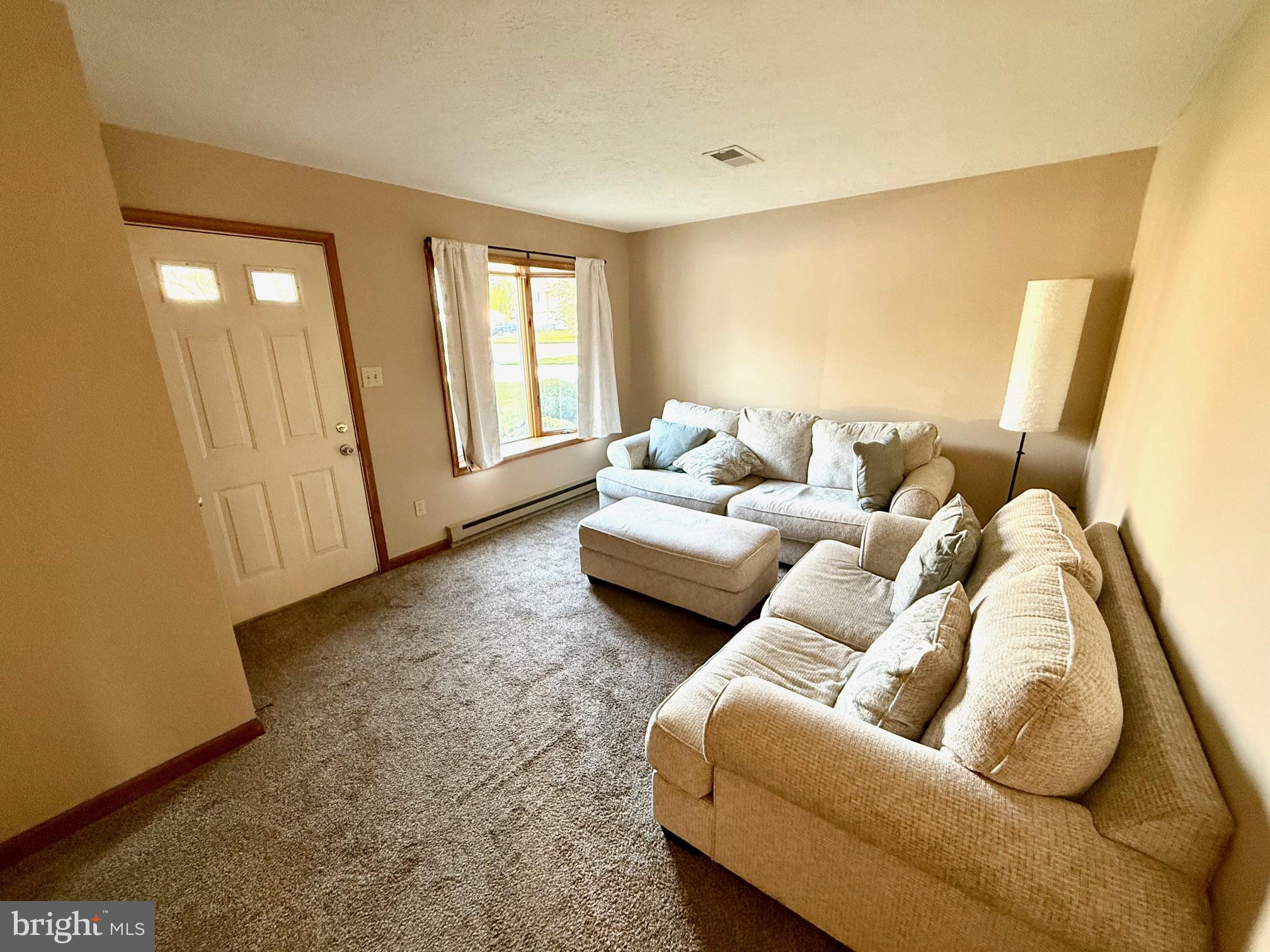 1121 Progress Road Chambersburg, PA 17201 - Photo 7 of 19 Cozy living space with natural light.