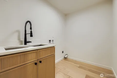 a view of a patio with couches table and chairs and potted plants