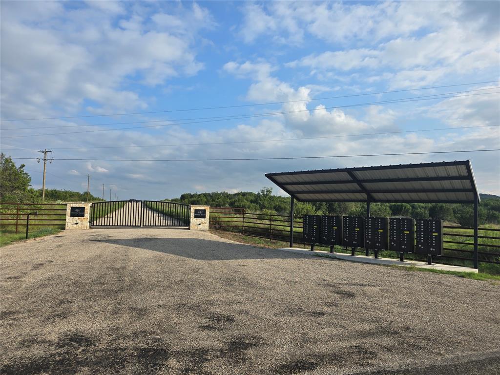 2277 Hidden Vly Road Glen Rose, TX 76043 - Photo 3 of 8 a view of large trees with a yard