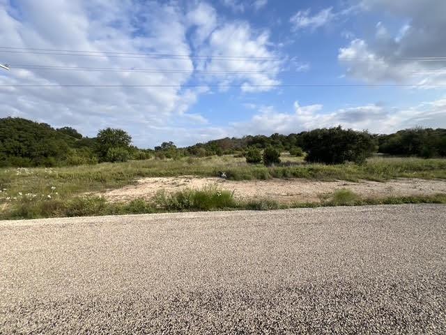 2277 Hidden Vly Road Glen Rose, TX 76043 - Photo 5 of 8 a view of a lake with a yard