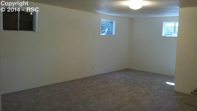 7512 Tudor Road Colorado Springs, CO 80919 - Photo 12 of 17 Extra Room w/ Walk-in Closet
