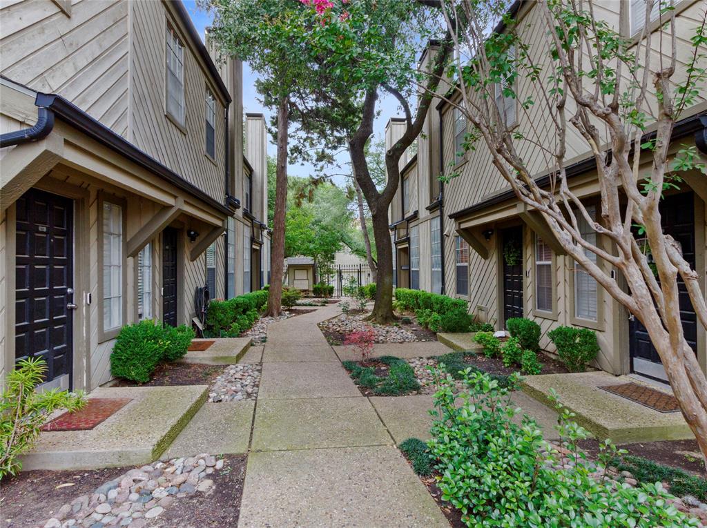 a view of a pathway with a house