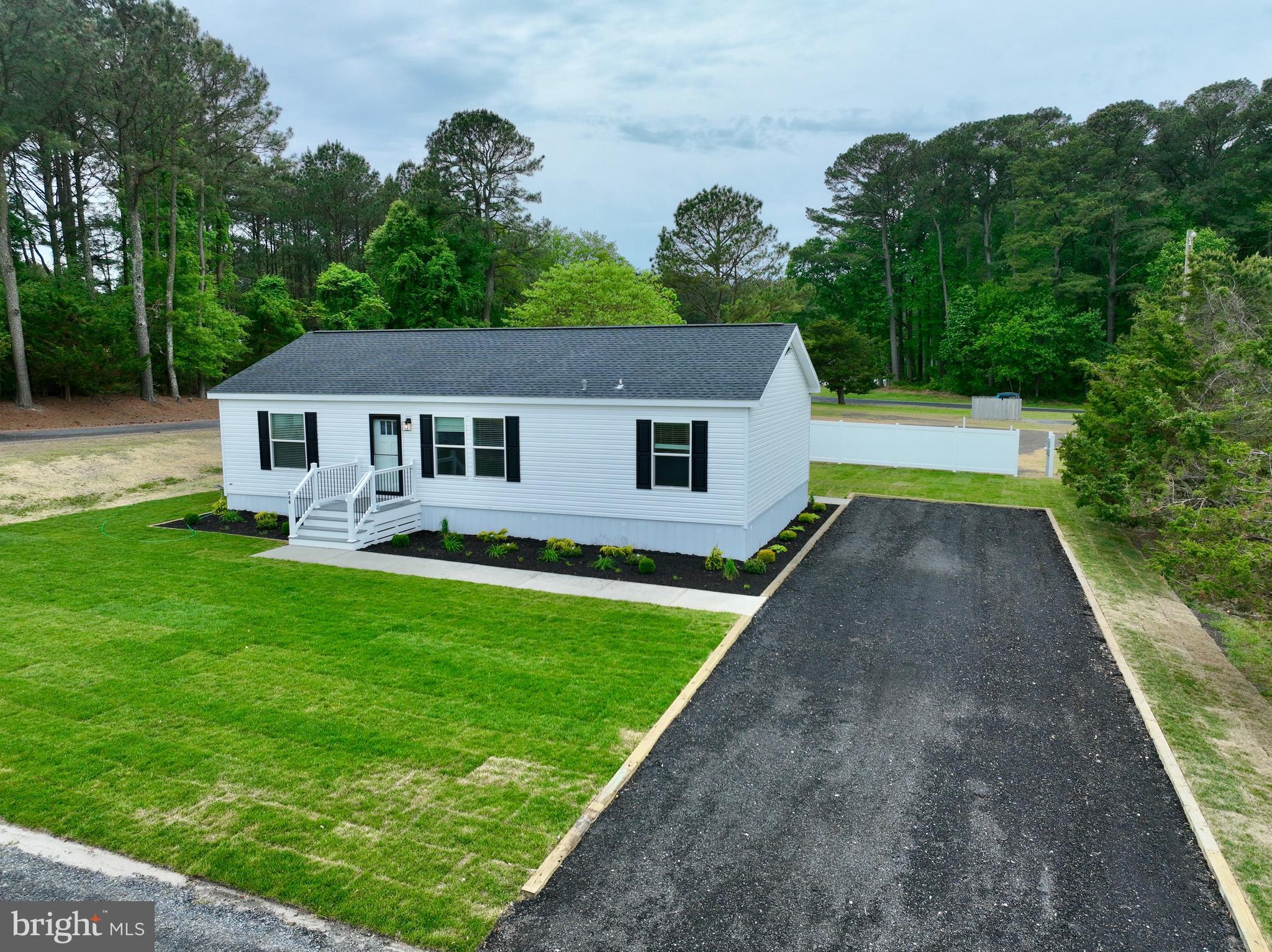 10323 Henry Road, Unit 24B Berlin, MD 21811 - Photo 54 of 56 a view of house with a yard