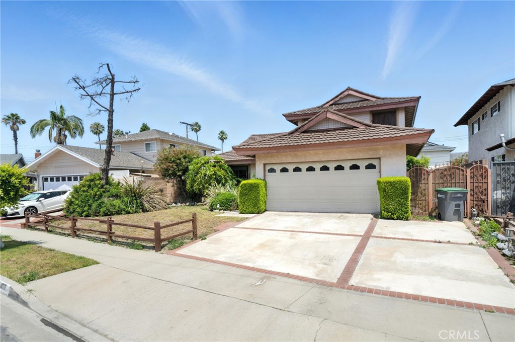 19717 Alonda Drive Carson, CA 90746 - Photo 3 of 31 a front view of a house with yard