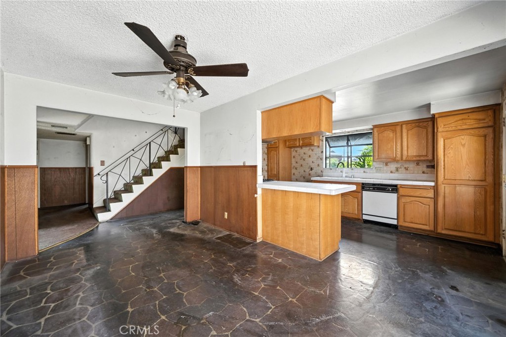 19717 Alonda Drive Carson, CA 90746 - Photo 7 of 31 a kitchen with a refrigerator a sink and dishwasher