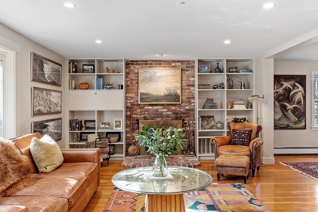 8 Honeysuckle Road Hamilton, MA 01982 - Photo 2 of 41 a living room with furniture and a fireplace