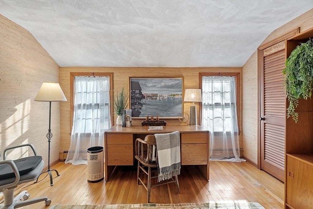 8 Honeysuckle Road Hamilton, MA 01982 - Photo 26 of 41 a dining room with furniture and wooden floor