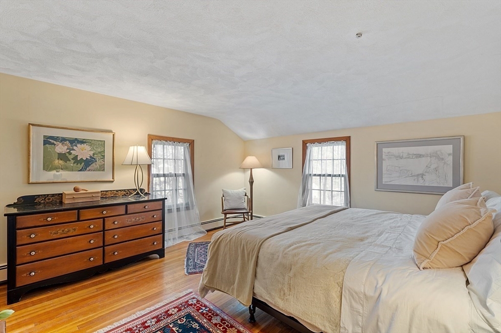 8 Honeysuckle Road Hamilton, MA 01982 - Photo 27 of 41 a bedroom with a bed and a dresser in it