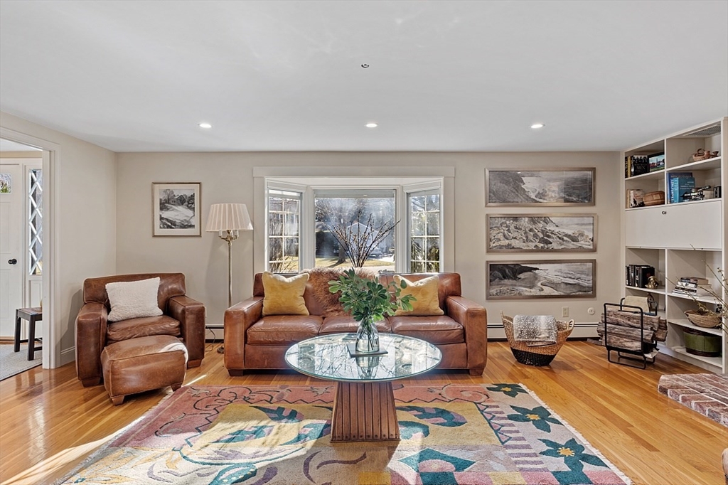 8 Honeysuckle Road Hamilton, MA 01982 - Photo 3 of 41 a living room with furniture and a table