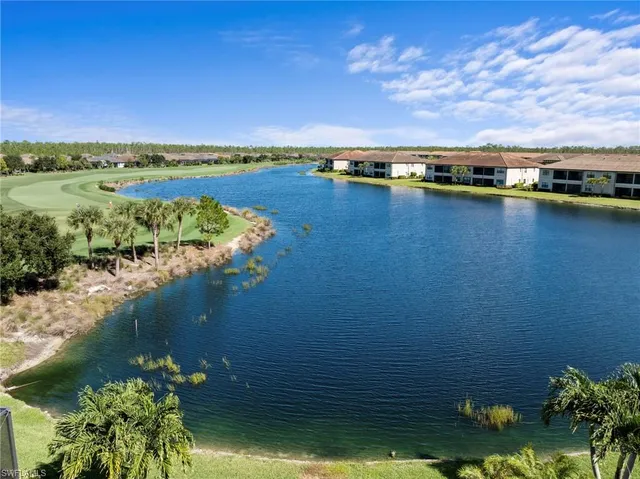 a view of a lake with a city